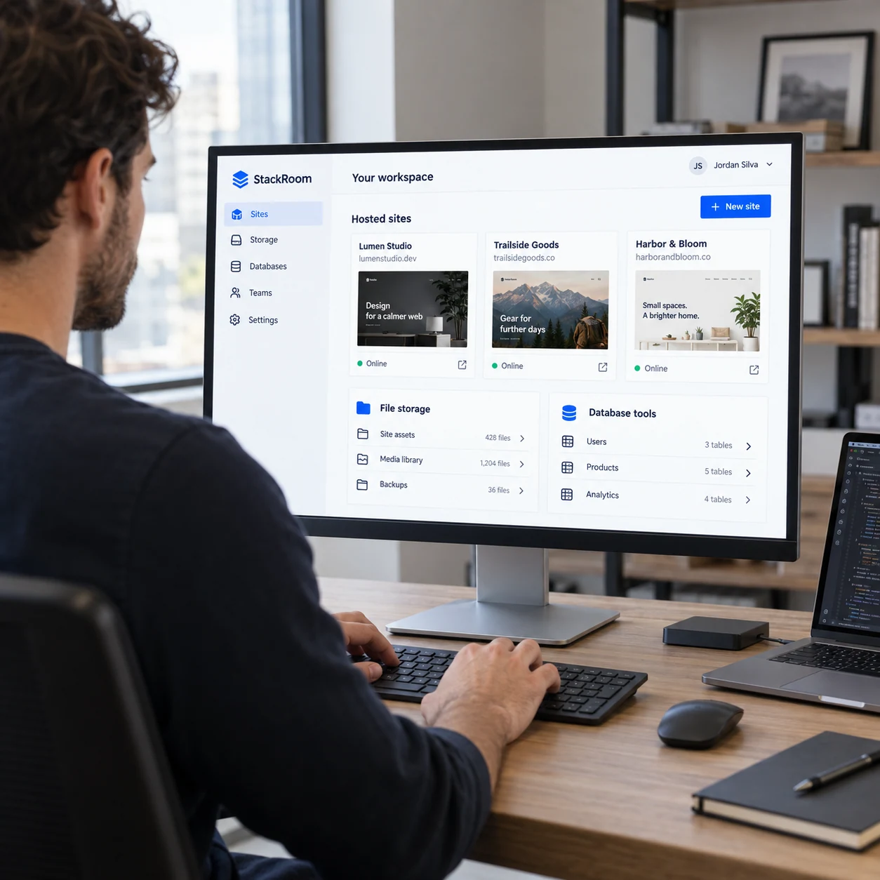 Desktop monitor shows fictional 'StackRoom' cloud workspace with three hosted sites, file storage and database tools; each site has a small different real website thumbnail
