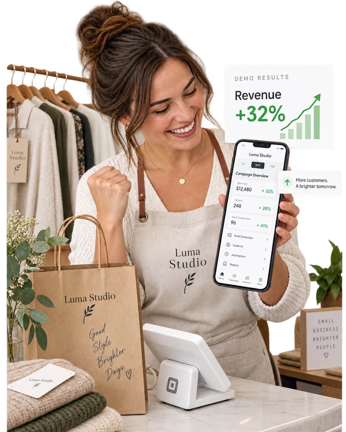 A delighted independent boutique owner beside a checkout counter using a phone held naturally low in her LEFT hand, screen tilted to viewer showing the fictional Luma Studio campaign overview